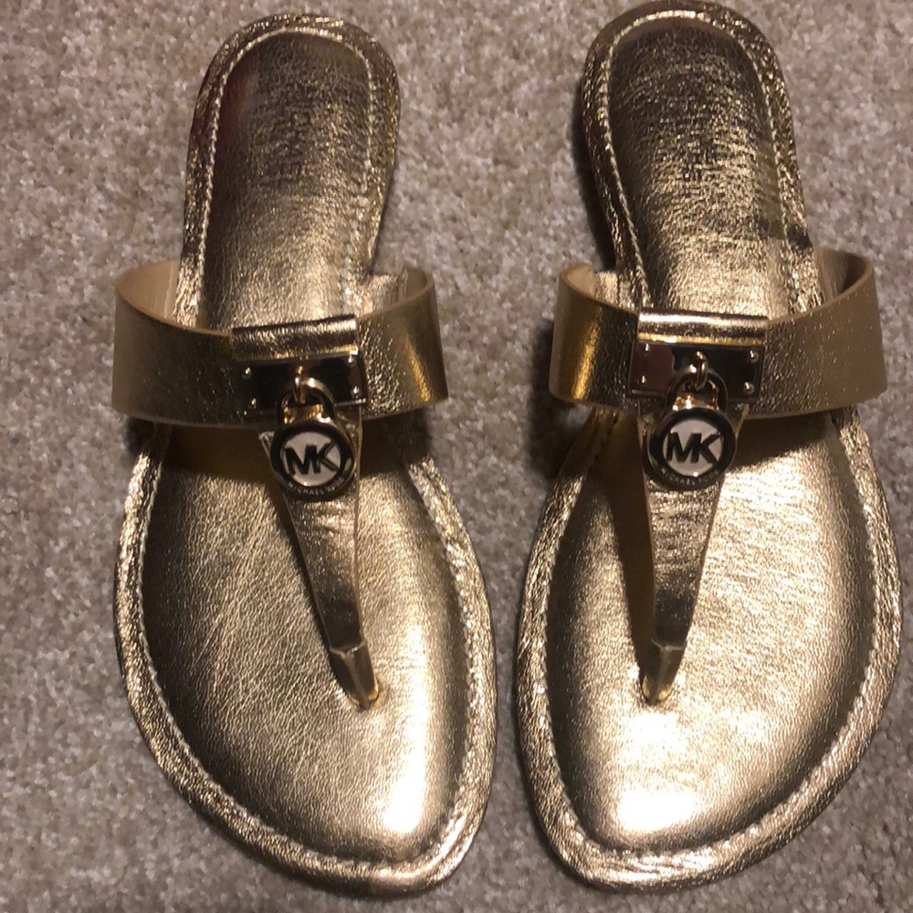 Michael Kors gold sandal. Brand new. Never worn